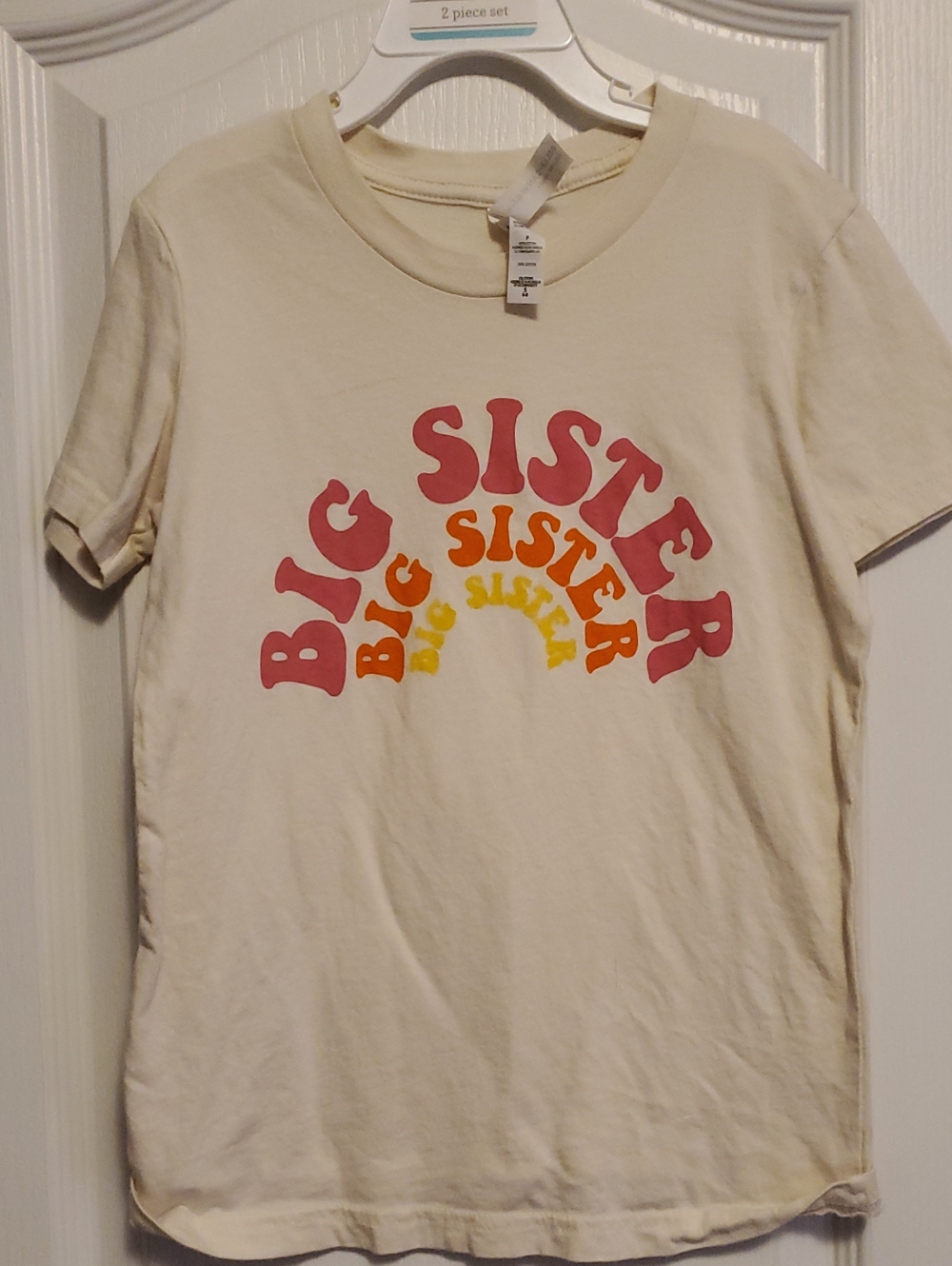 Bella Canvas Cream Tee with Pink, Orange & Yellow Retro "Big Sister" Graphic